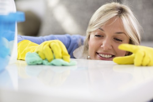 Technician cleaning hallway carpet in a Marylebone property