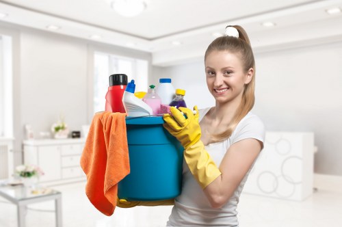 Trained carpet cleaner using protective equipment
